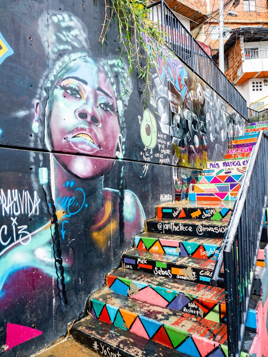 Colorful Comuna 13 stairway and mural in Medellín