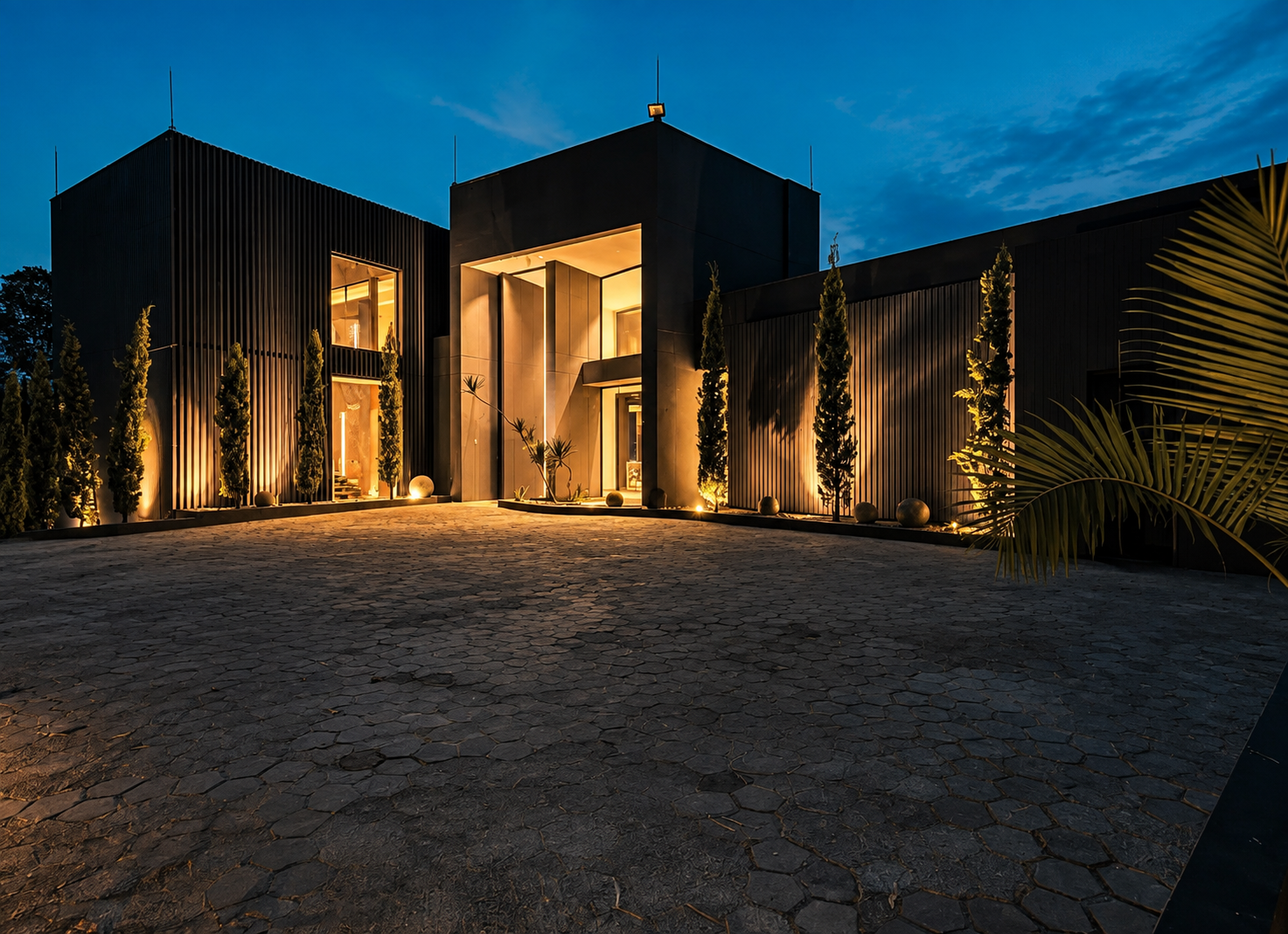 Modern villa glowing at dusk